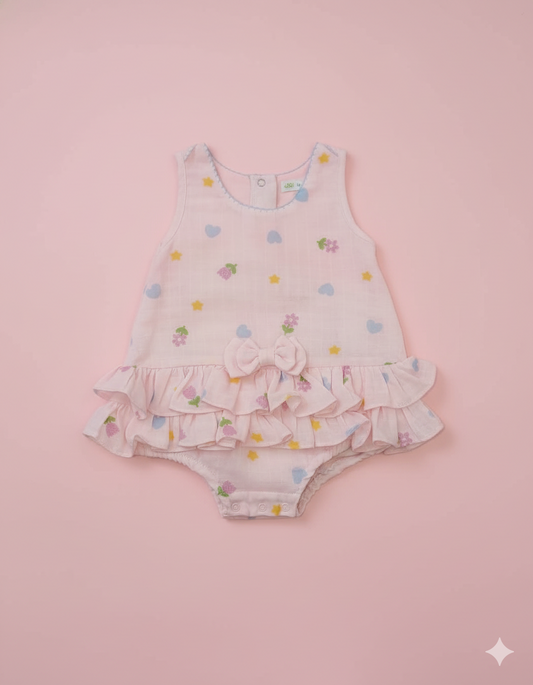 ENTERIZO CON VOLANTES ESTAPADO ROSADO